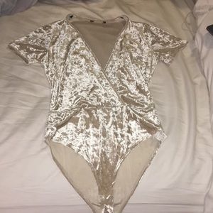 never worn suede bodysuit